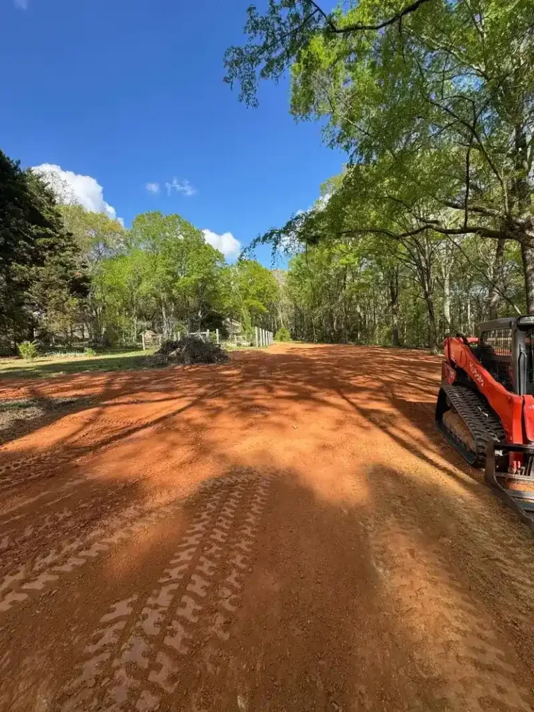 Basement excavation area with excavator and skid steer on a residential site in Charlotte NC