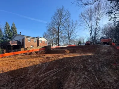 Cleared residential lot with graded soil after land clearing and site preparation