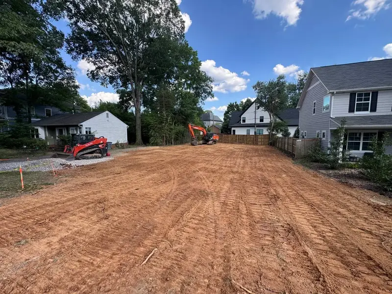 Cleared residential teardown lot prepared for a new home build