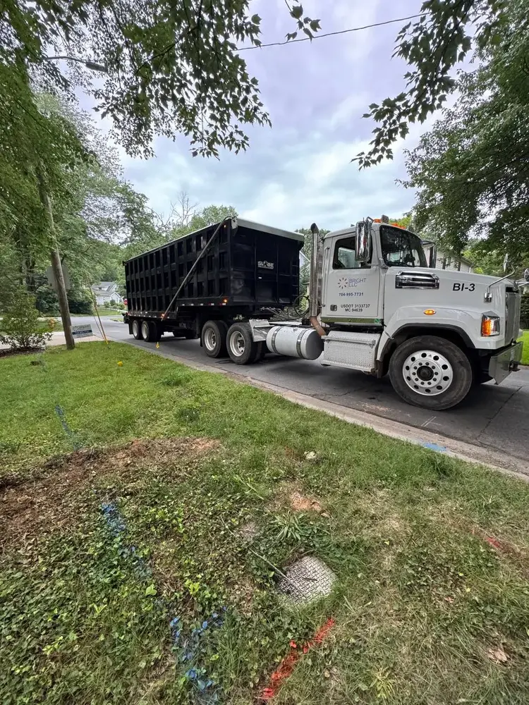 Bright LLC dump truck used for tree debris haul-off